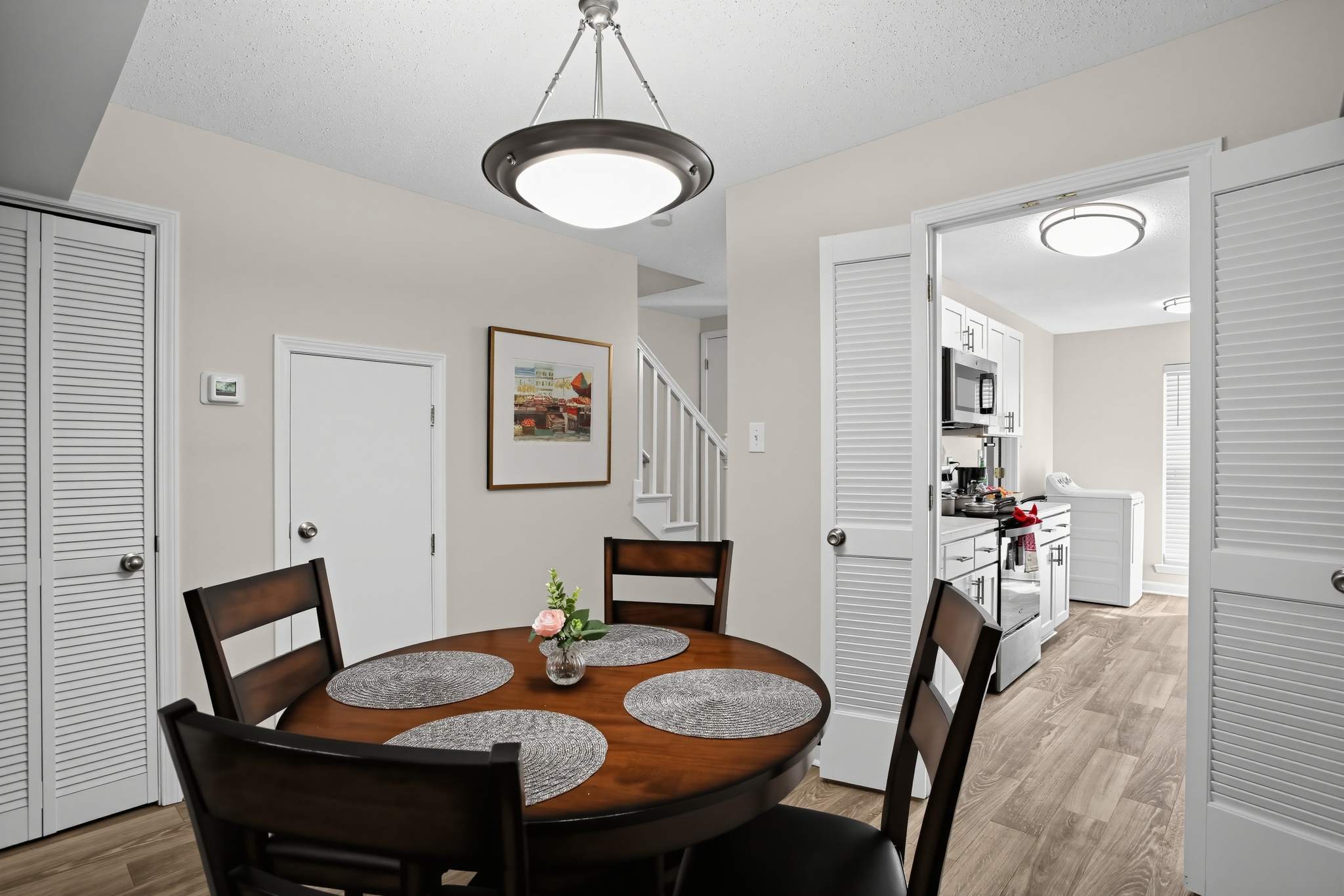 Bright dining area for 4 with easy access to a modern kitchen
