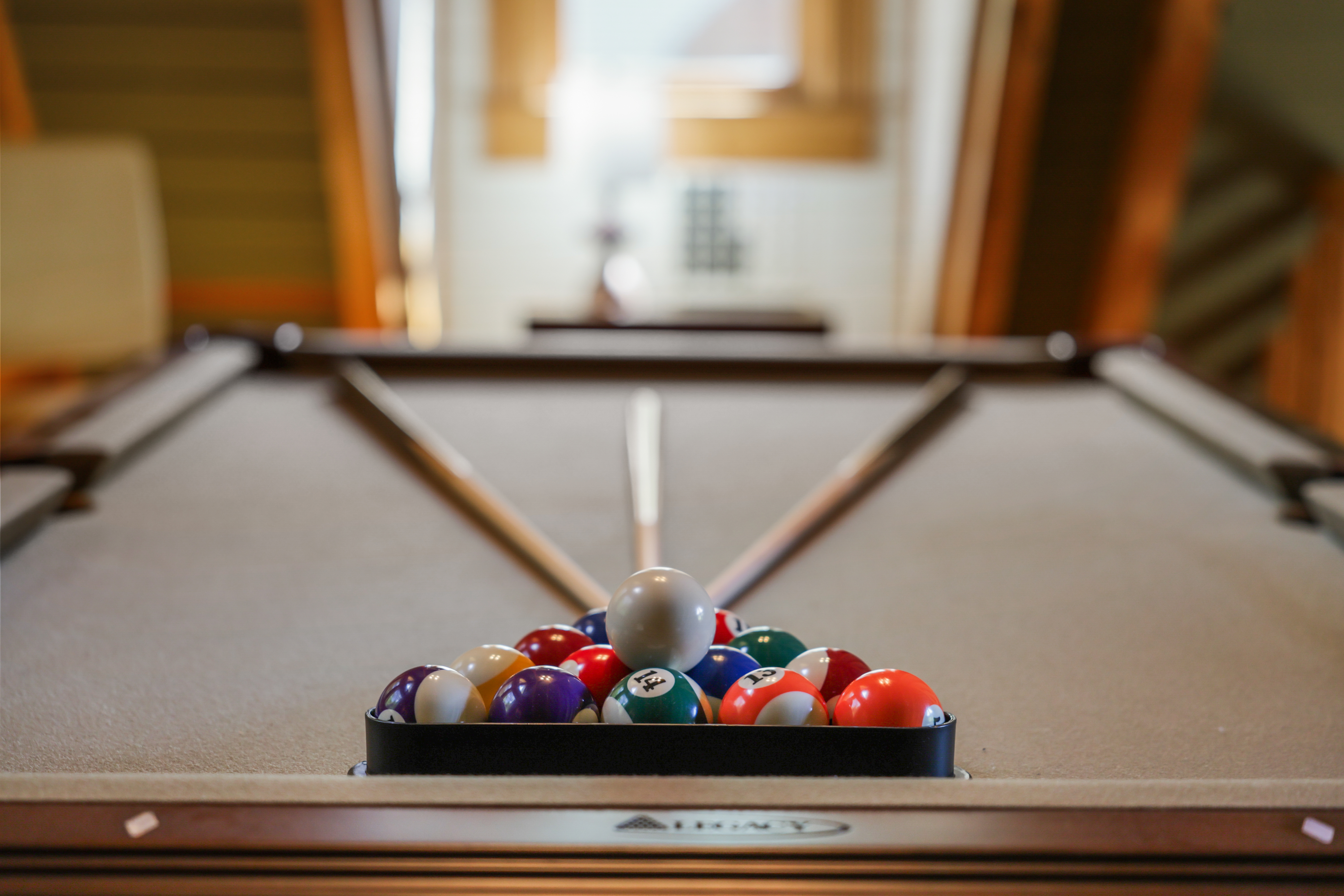Cozy game room with pool table for fun, relaxed evenings indoors