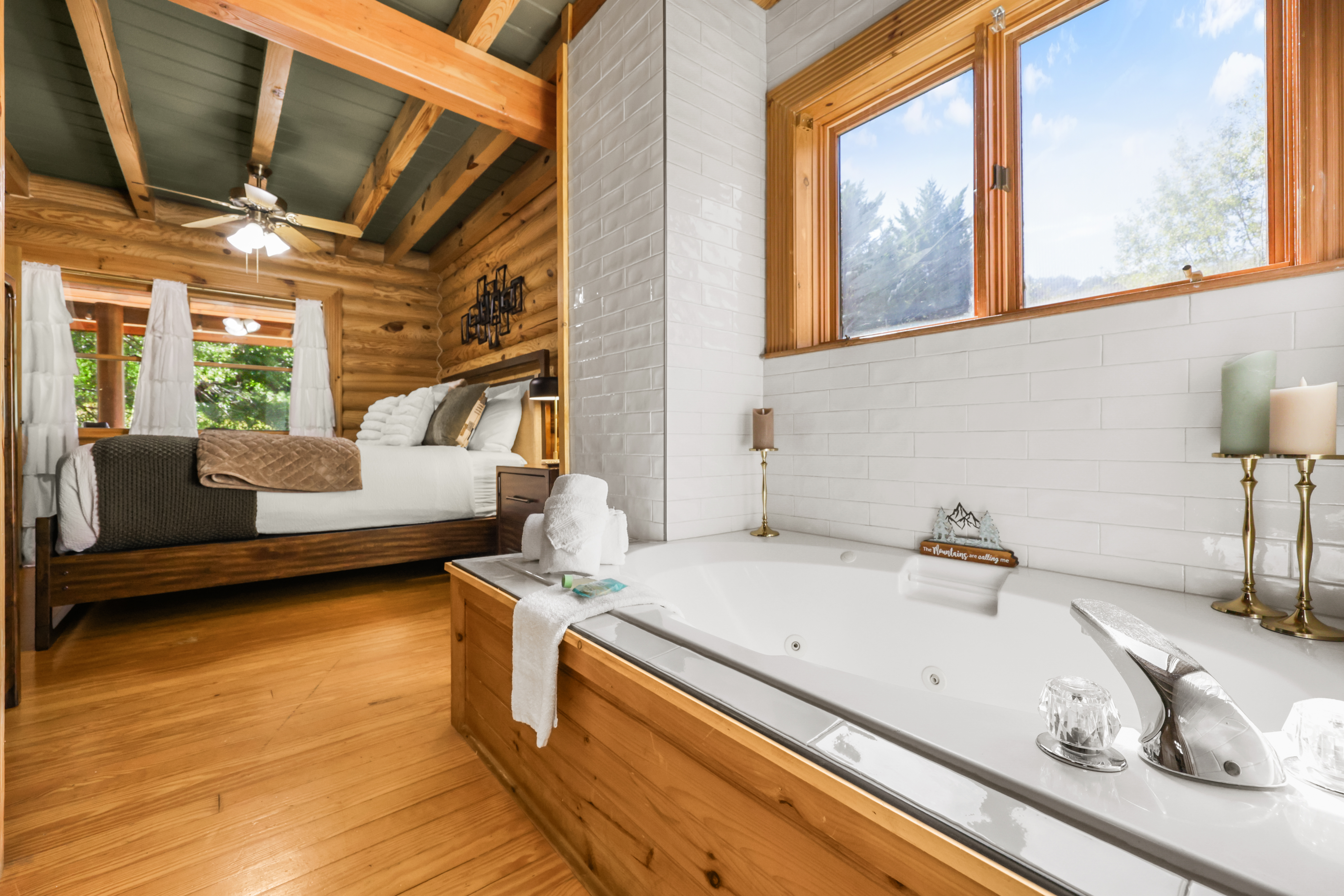 Cozy log cabin suite with in-room soaking tub and warm rustic charm