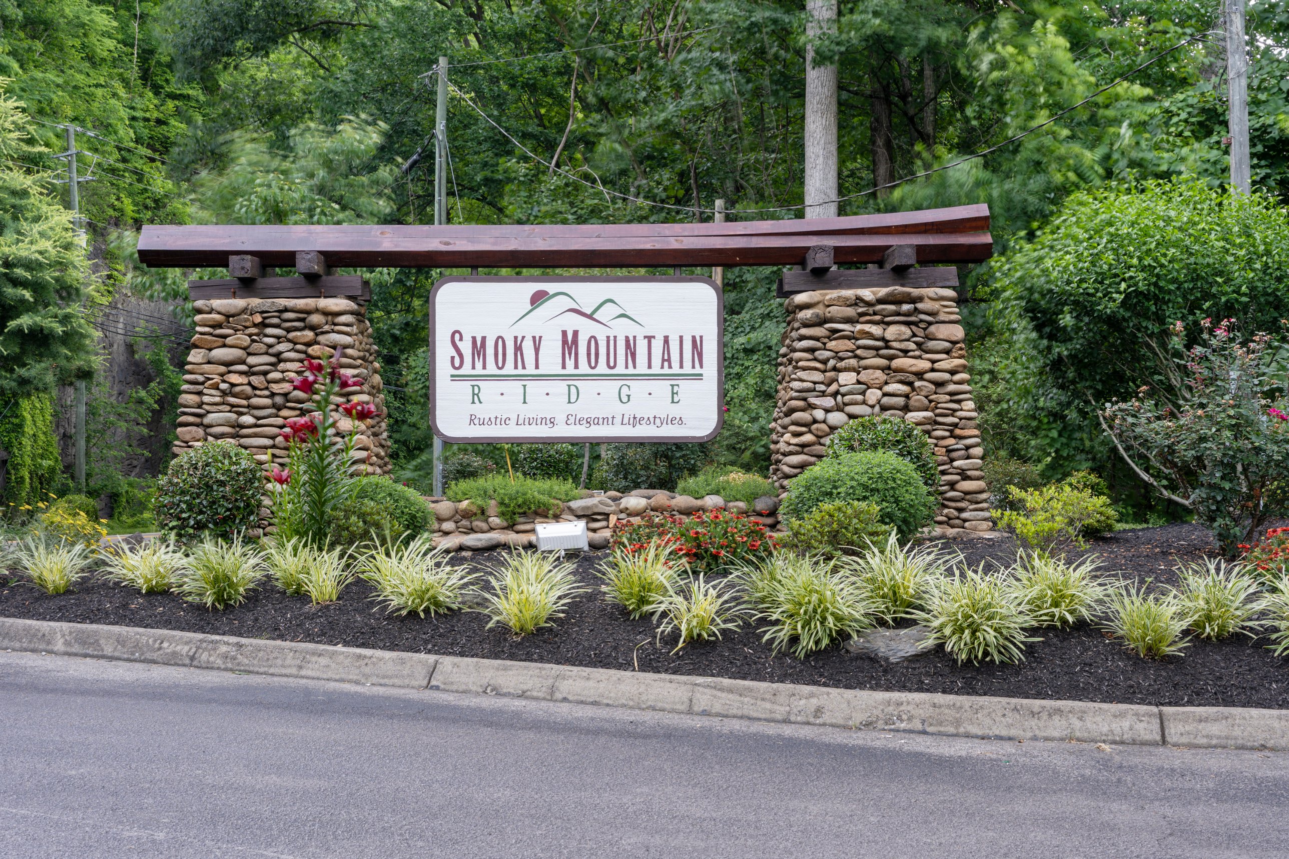 Look for the Smoky Mountain Ridge sign on arrival. Both cabins sit inside this community.