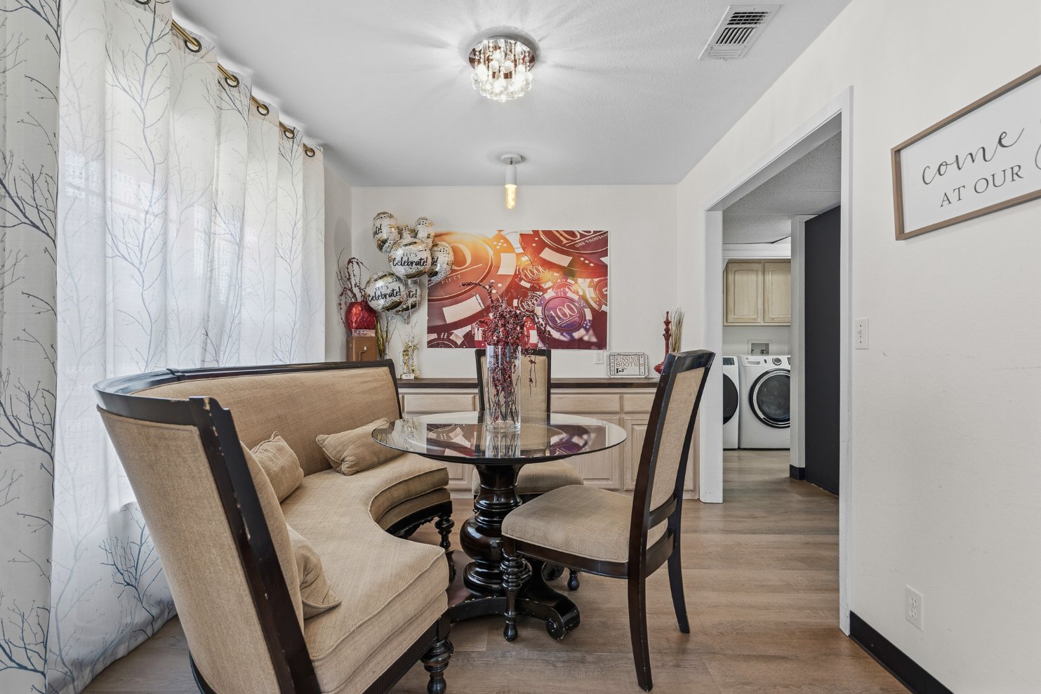 Bright, stylish dining nook with elegant seating and natural light