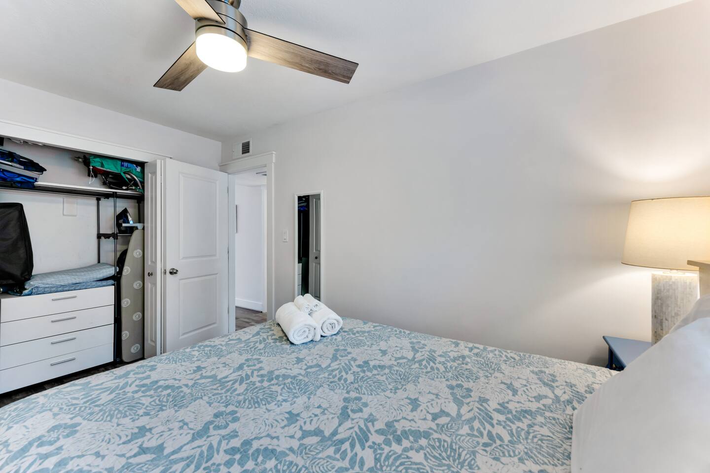Rest comfortably in this bright, coastal-inspired queen bedroom