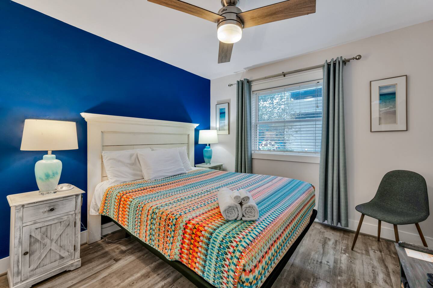 Comfortable queen bedroom with calming coastal décor