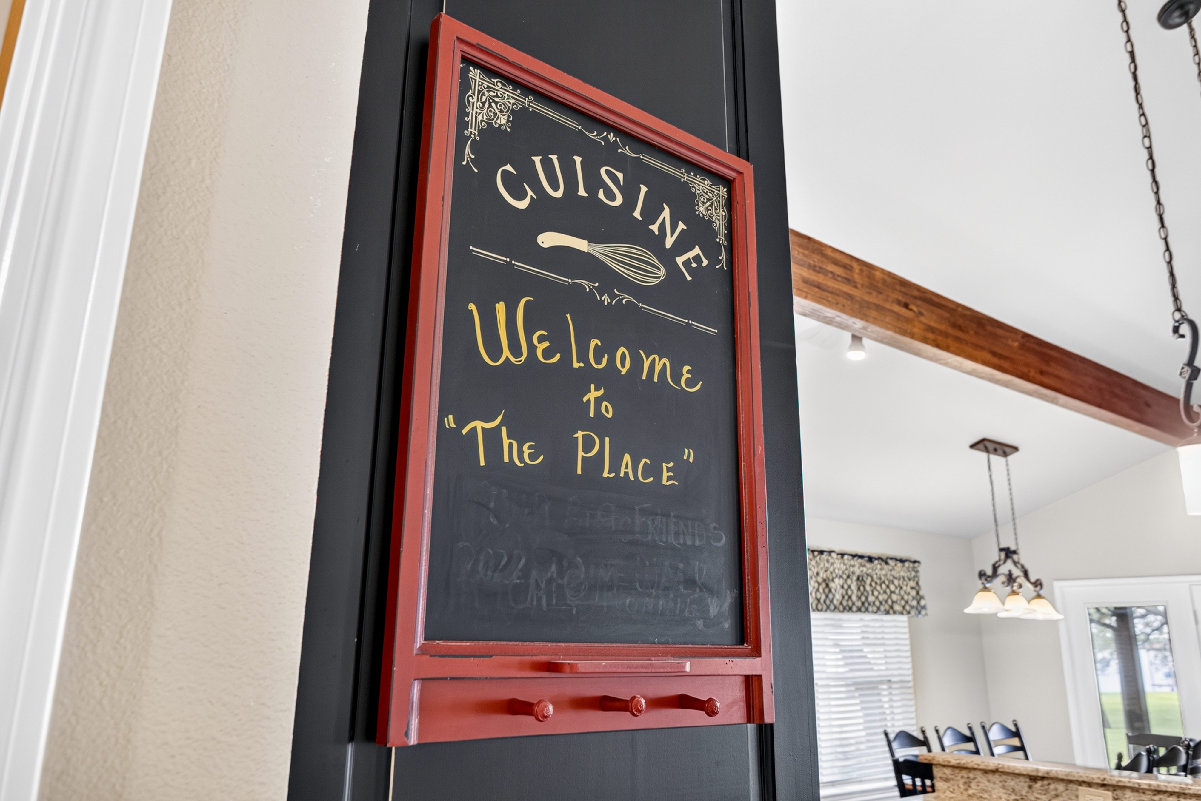 Charming kitchen welcome sign with warm, inviting farmhouse style