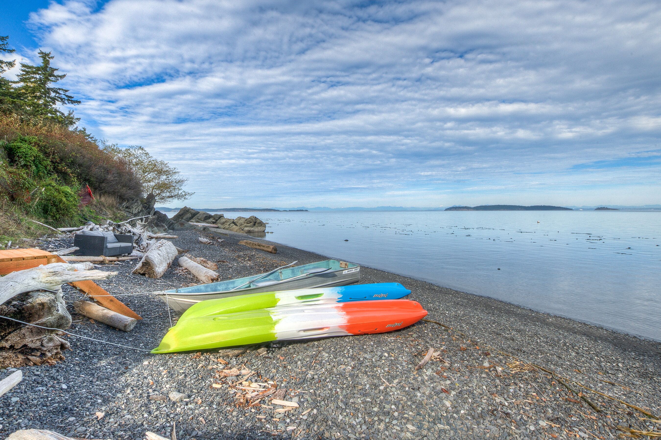Two kayaks and a rowboat for you to enjoy