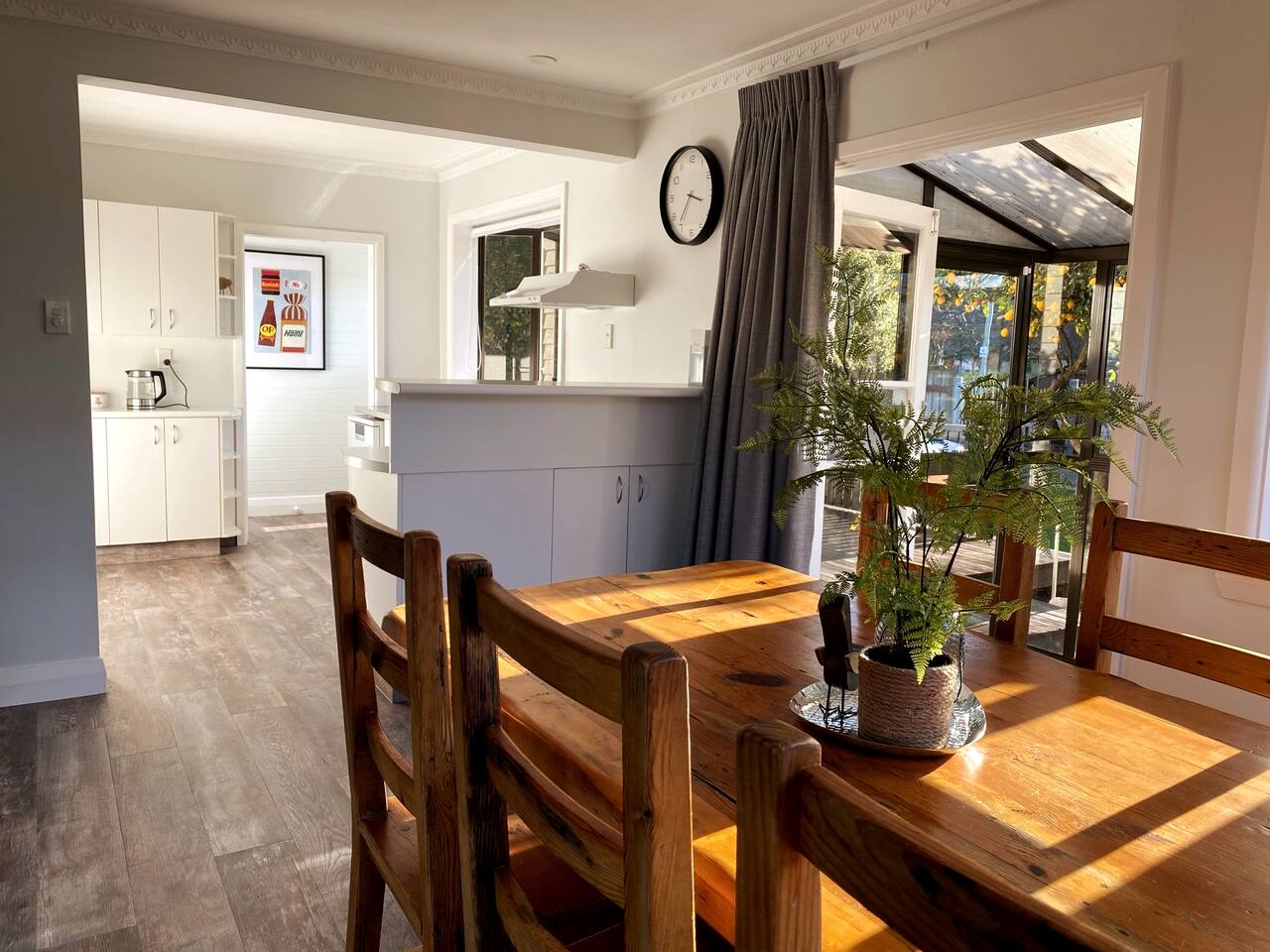 This refurbished house takes in the sun throughout the day, these photos taken at 2pm show the beautiful sun in the dining living room.