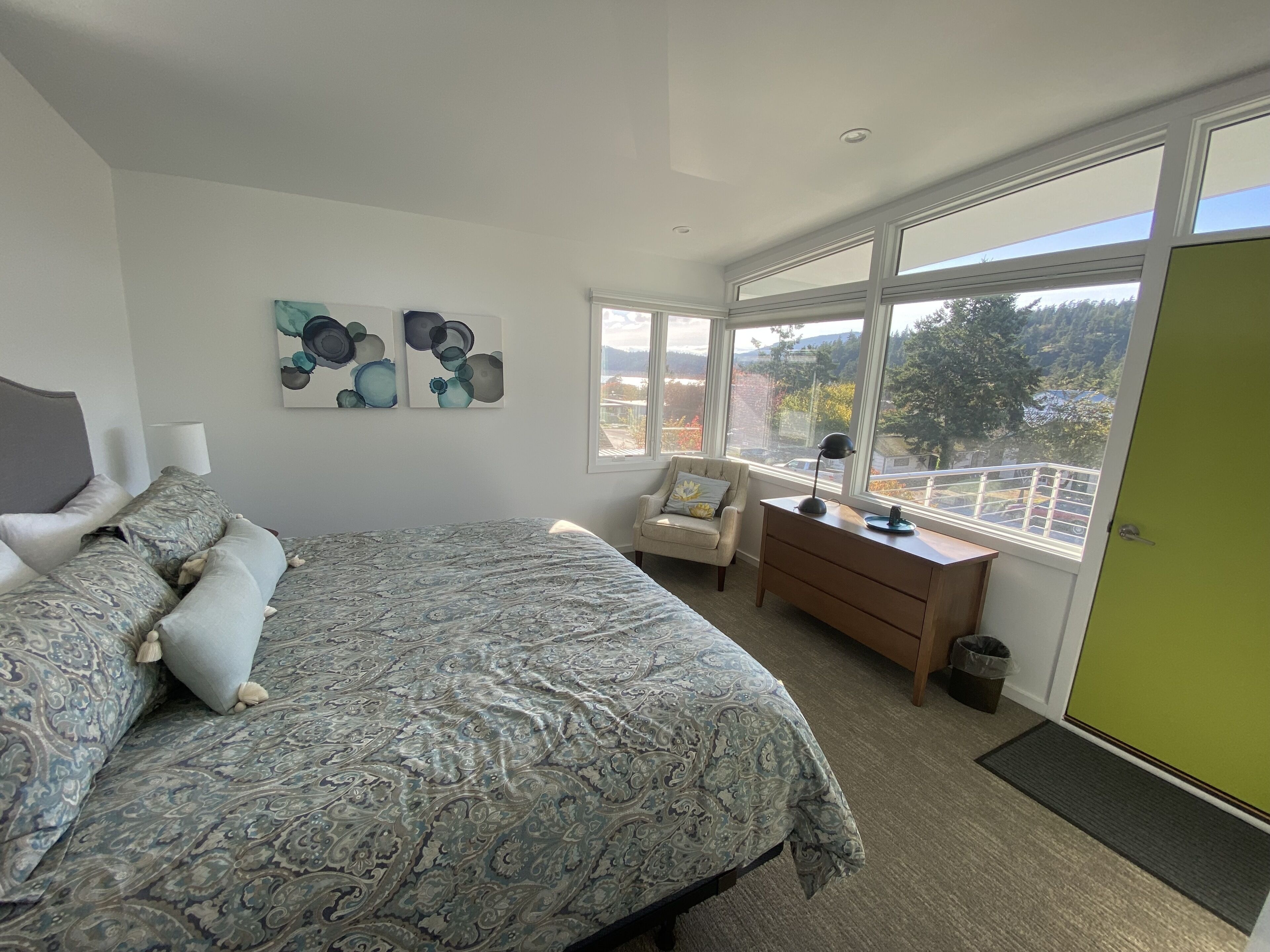 Upstairs bedroom view of downtown and mountains beyond.