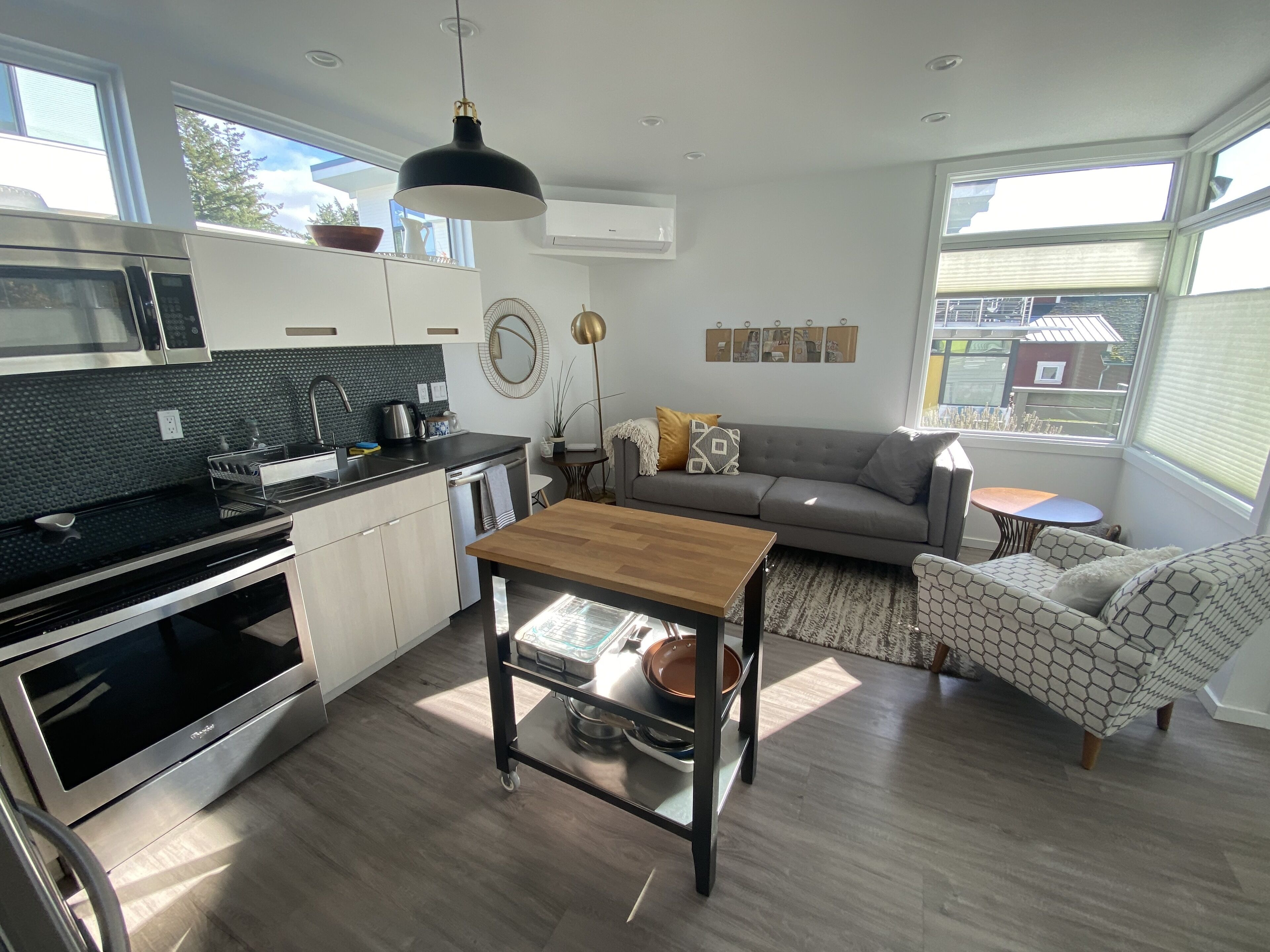 Kitchen island provides additional working space when cooking.