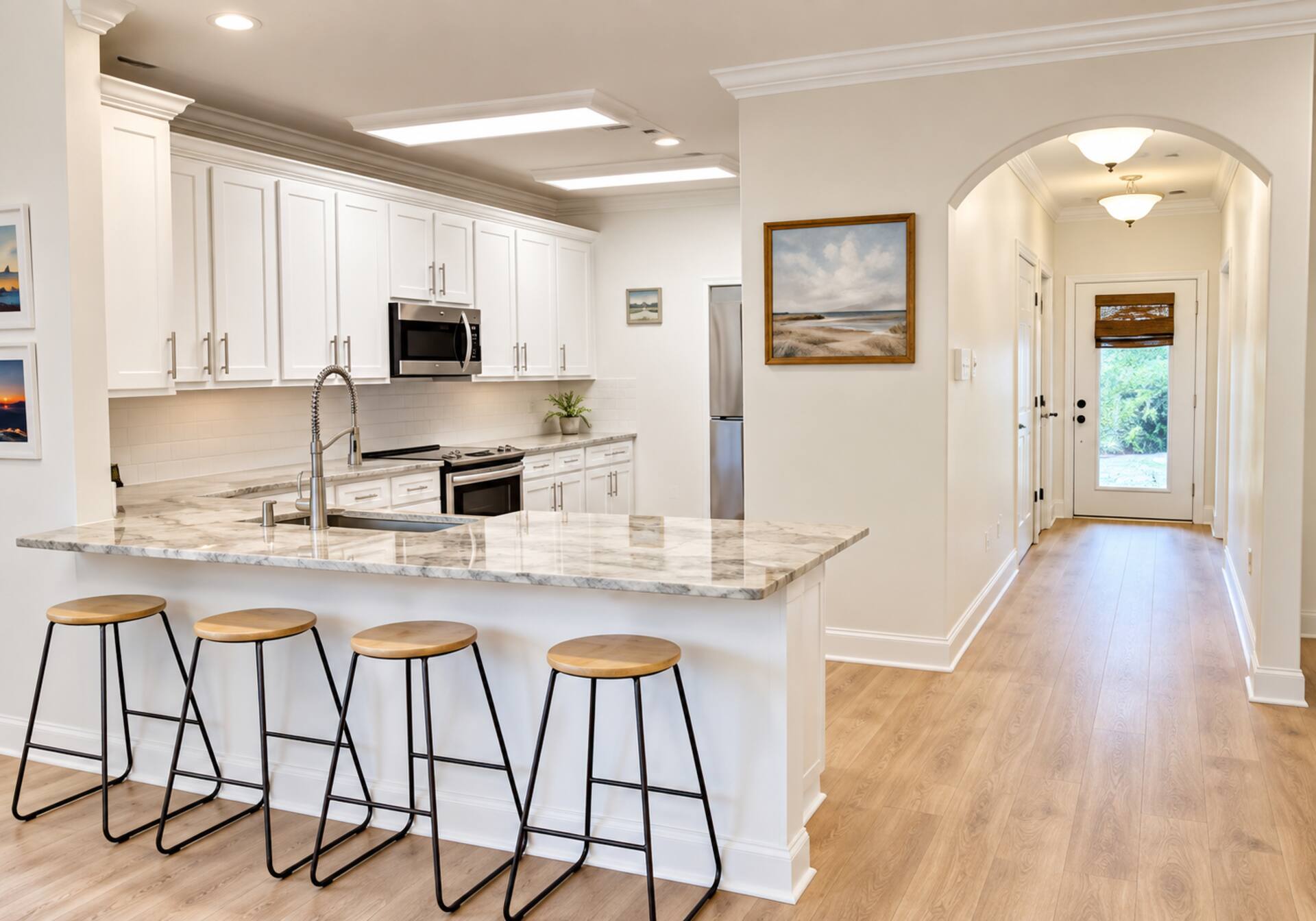 Bright gourmet kitchen with large island seating for 4