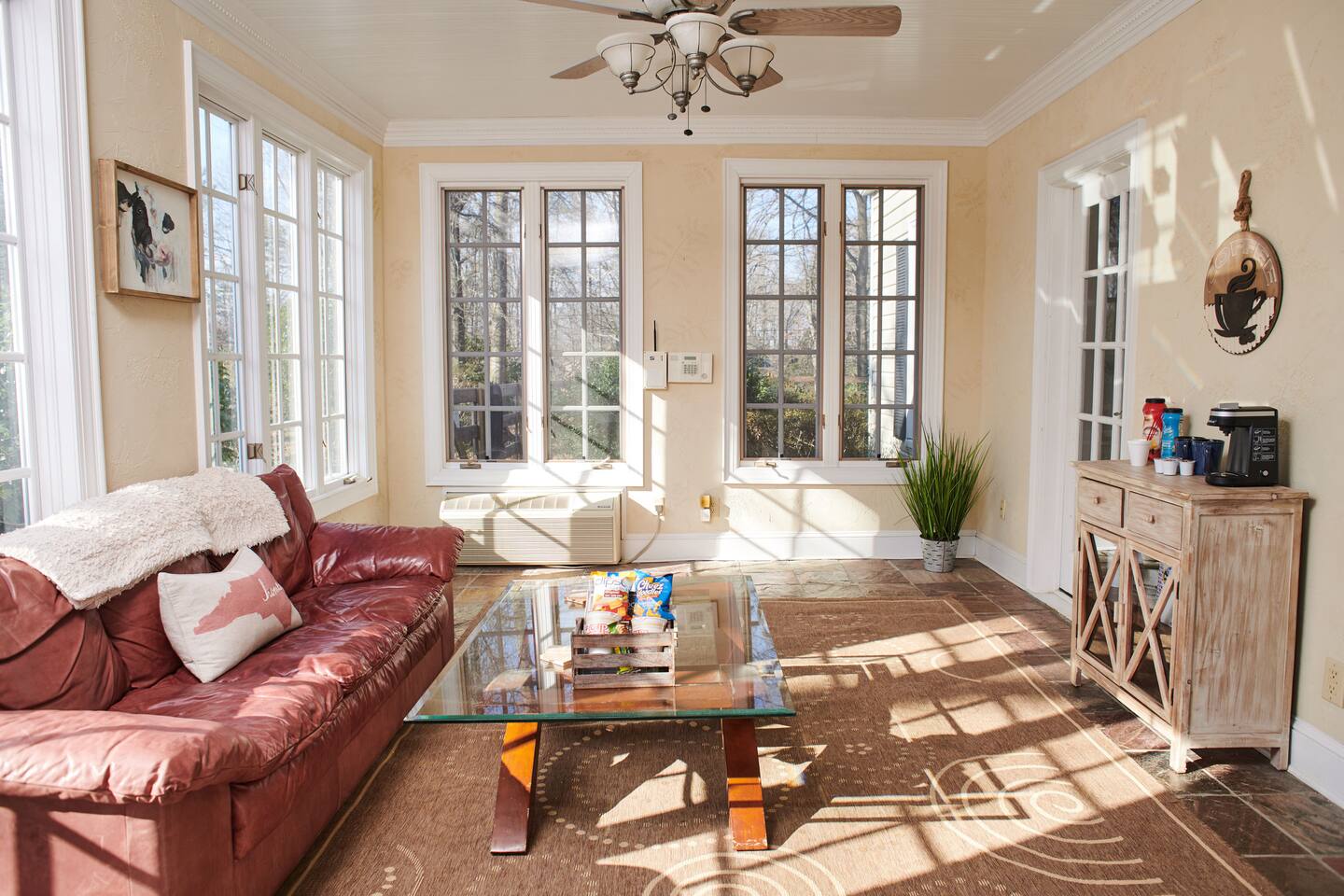 In-law suite, w/private entrance +Sunroom & patio!