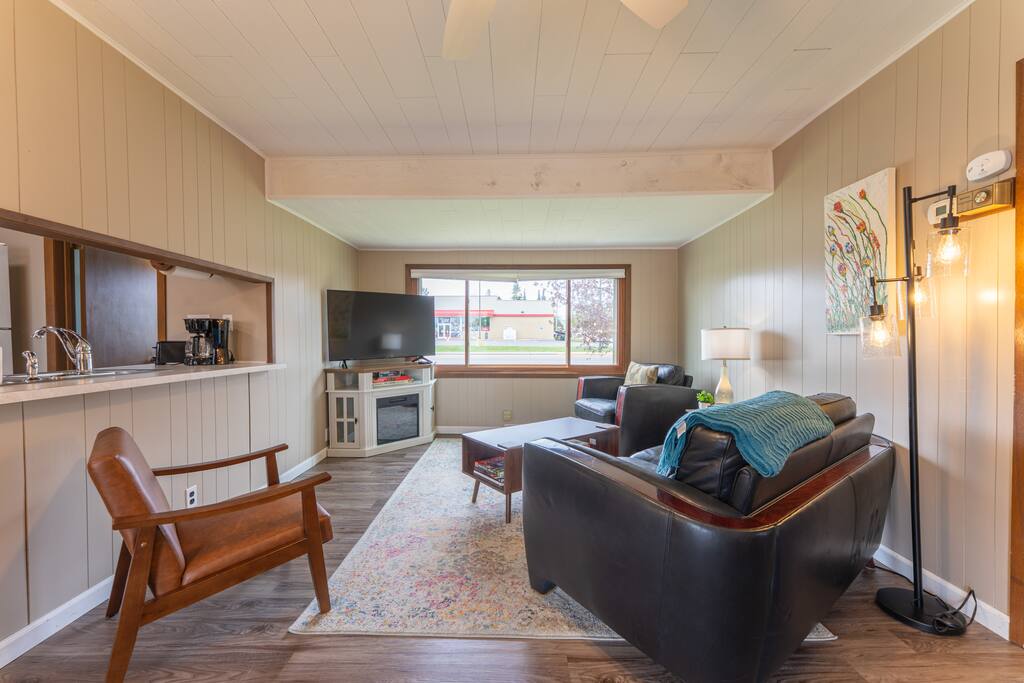 Vacation UniquEly | home in town, with patio