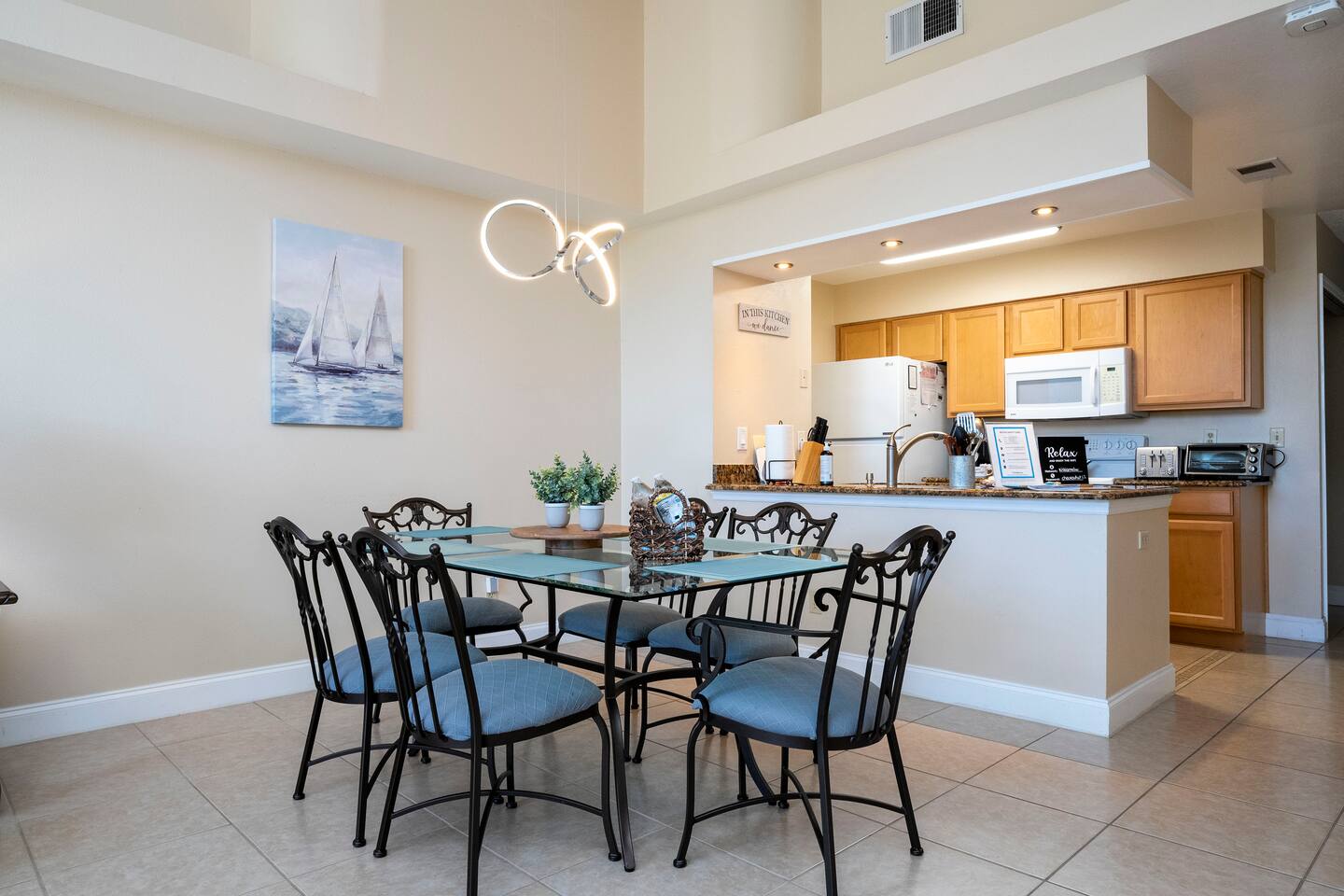 Gather for meals, game nights, or planning your next Disney adventure. 
Dining room and fully equipped kitchen. 
Amy who stayed in July 2022 said, "The full kitchen was also very nice"