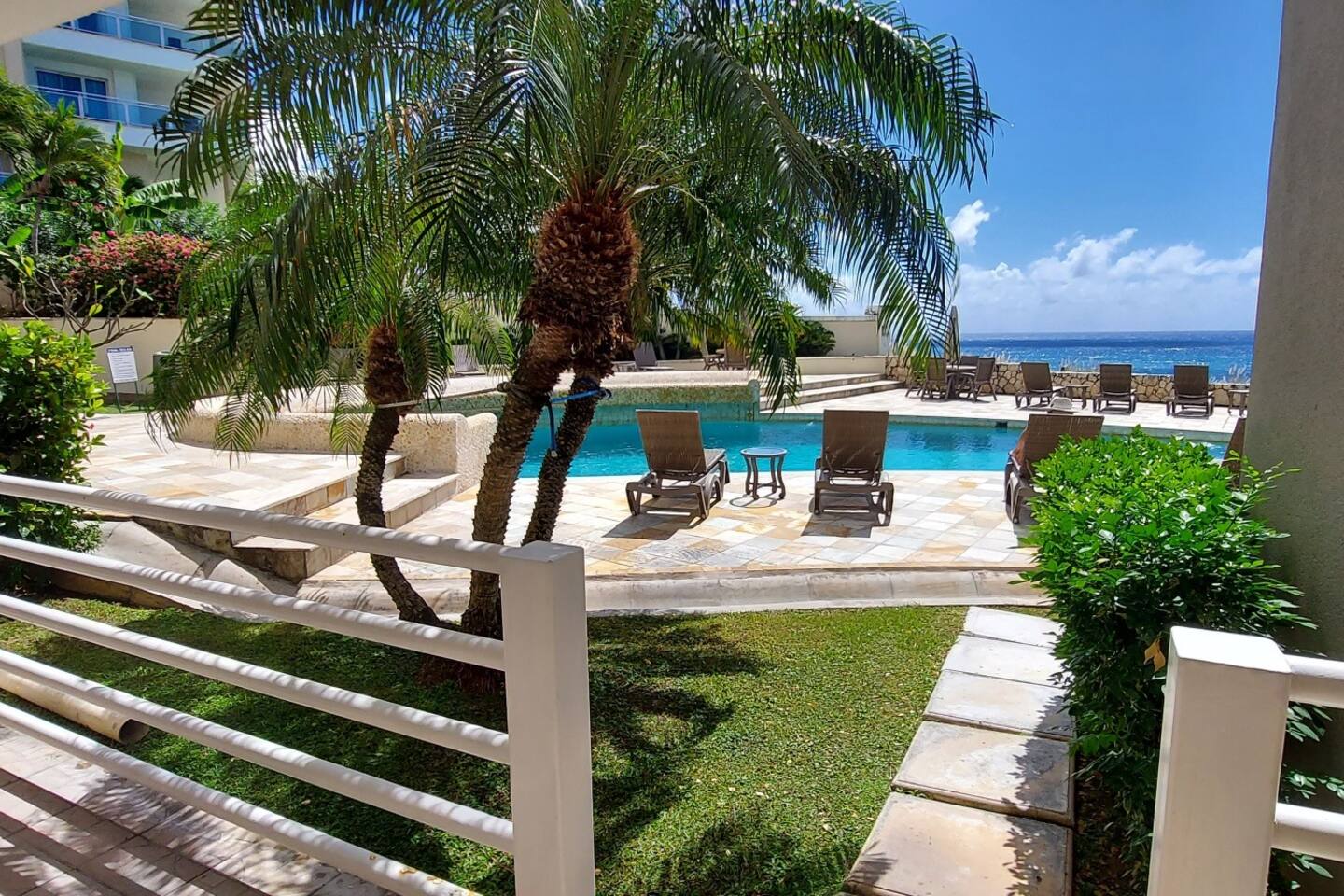 Oceanfront Bliss: 3-Bedroom, Pools & Peloton bike!