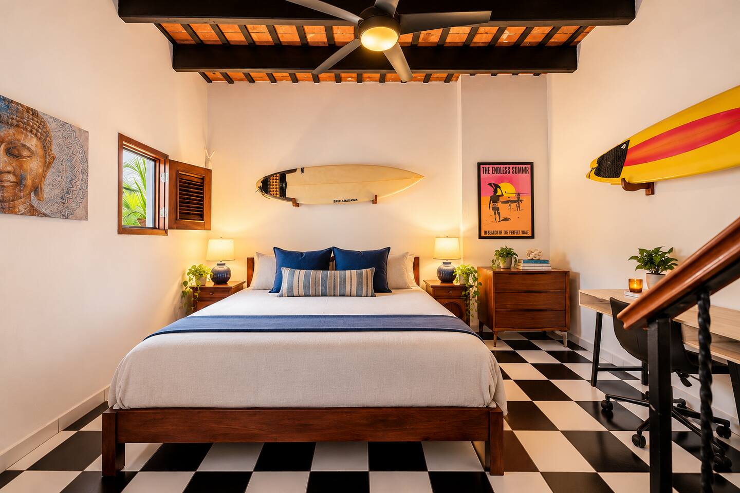 A little work, a lot of play! This bedroom features a dedicated workspace, colorful surf-inspired décor, and plenty of room to settle in. The perfect home base for balancing downtime with adventures around Old San Juan.