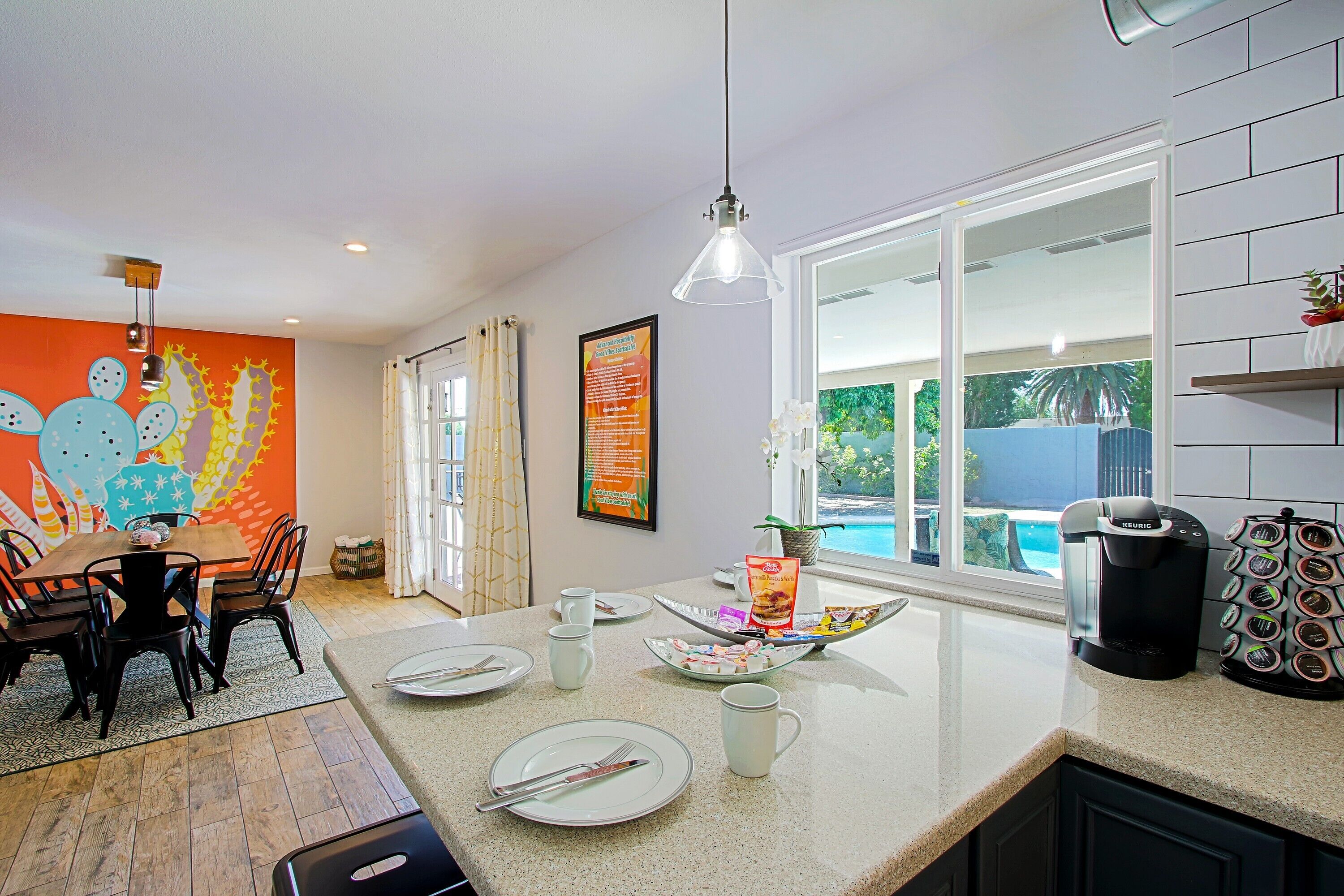 Another custom mural? Yep! Enjoy coffee in the morning while gazing at the pool!