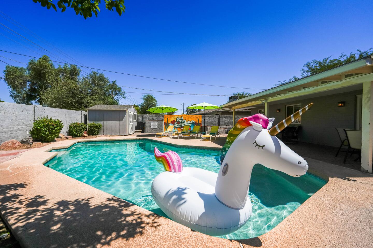 There are always an abundance of pool toys in the pool shed. You might even see a rainbow unicorn!