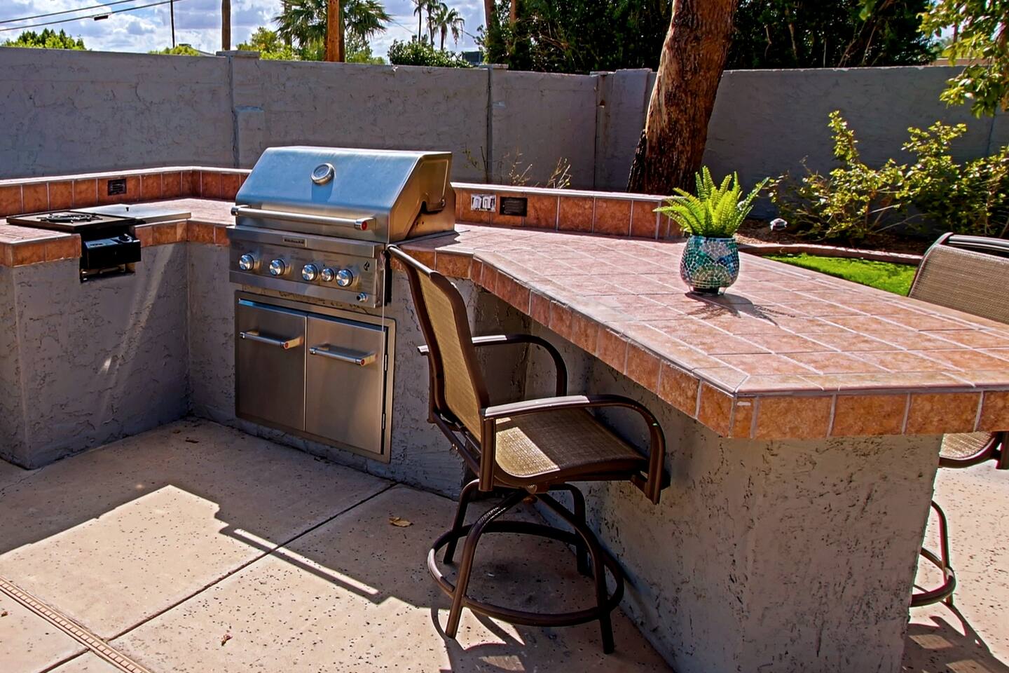 The BBQ island awaits. All of the BBQ tools are in the kitchen drawer. All that's missing is you! If you want to try some hipster AZ BBQ just three minutes by Uber from the house, check out Starlite BBQ & Bar!