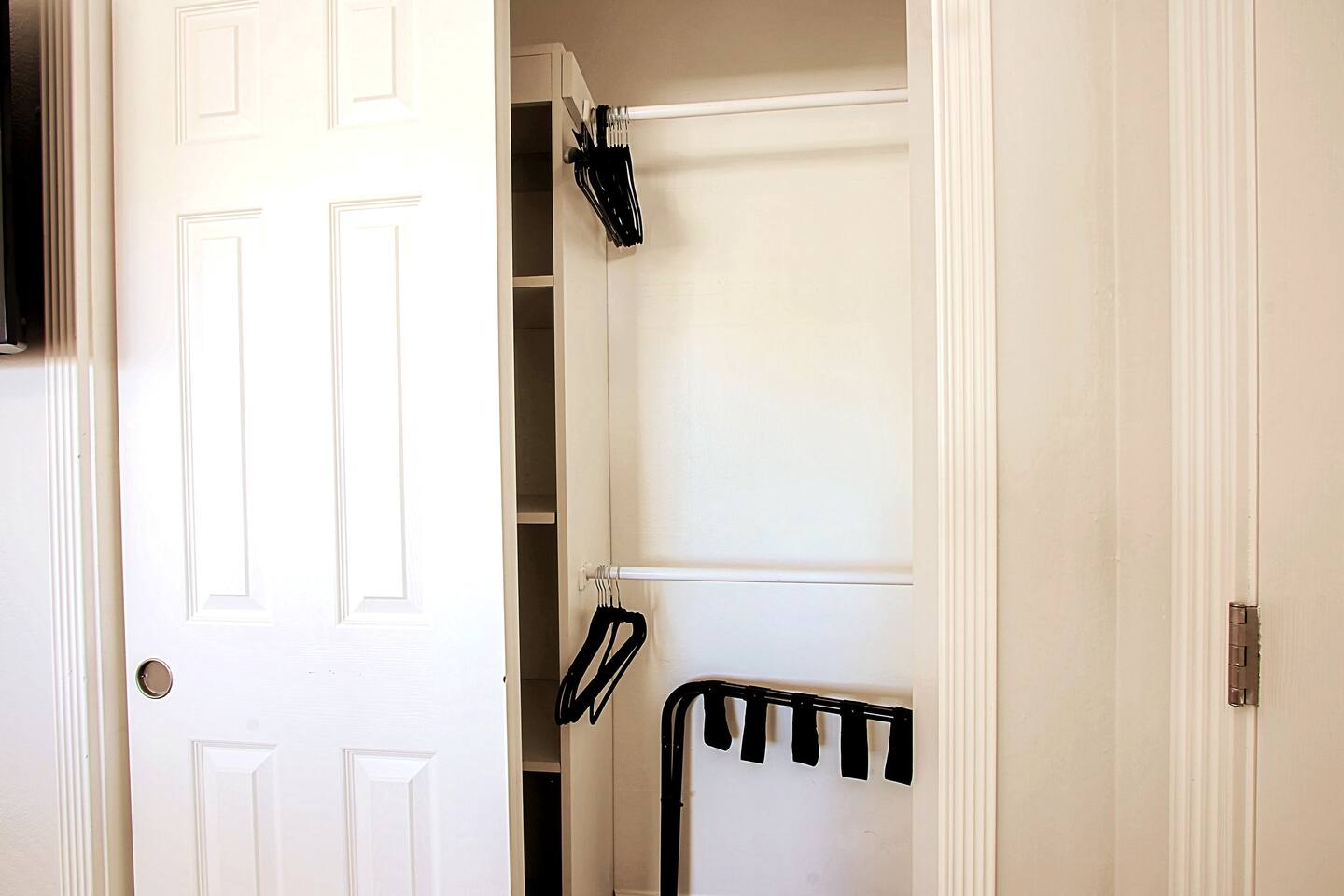 Hangers and luggage rack in every closet. This is the 2nd King Room closet.