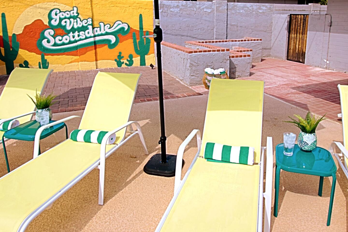 A place to lounge and take in the warm Arizona sun. Icy cocktails by the pool. Cactus garden and mural in the background. Take a few photos with the mural while you're at it!