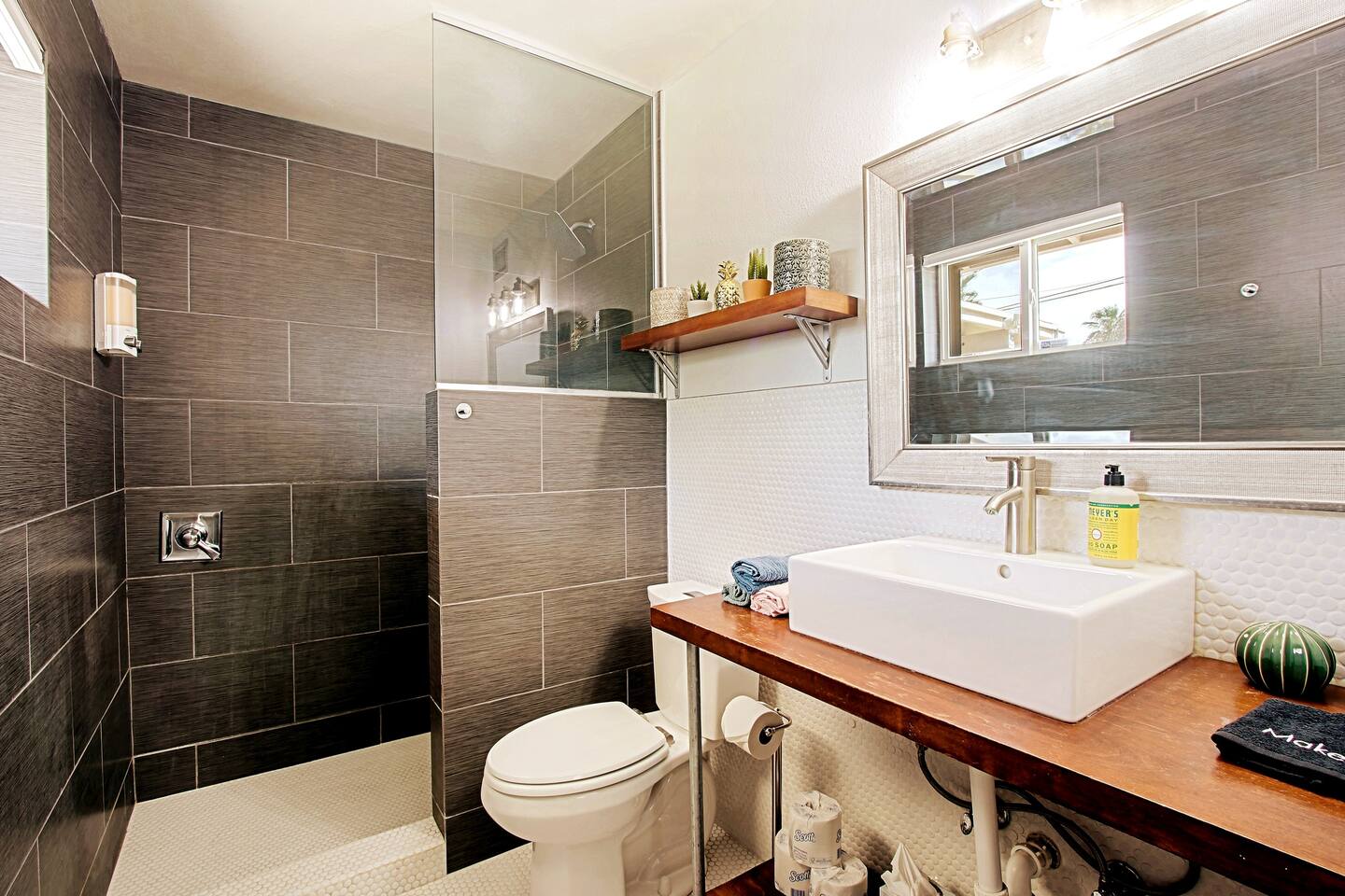 Primary Bathroom is ensuite with everything you'll need for a great getaway with friends or family. Rain shower head with shampoo, conditioner and body wash provided.