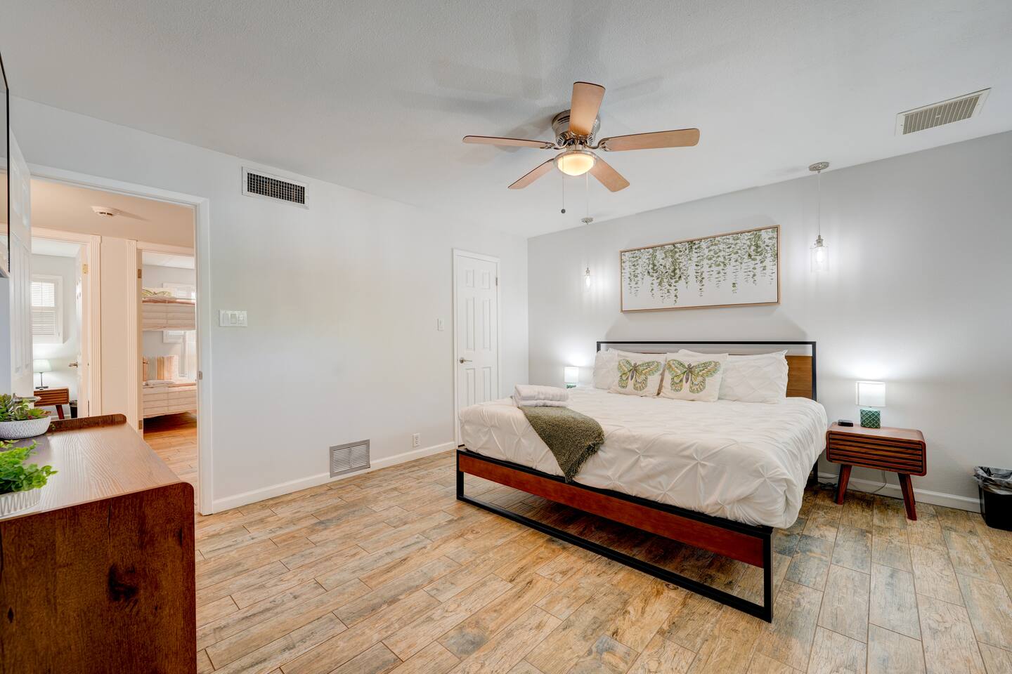 The primary suite with en suite full bath, lots of places to unpack and a 55 inch smart TV!