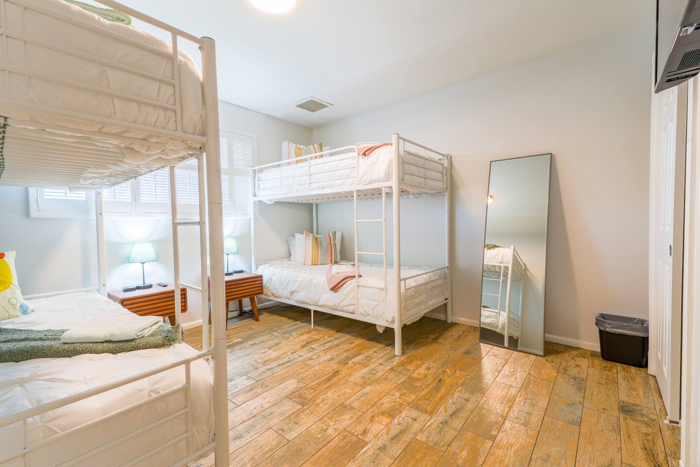 The "bunk room" sleeps four adults or children comfortably with a smart TV, a full-length mirror and luggage racks in the closet.