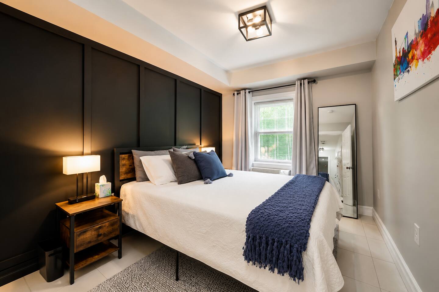 Sleep in comfort in the Black Room!

Bedroom includes:
- Super comfortable memory foam mattress
- 2 Nightstands 
- 2 touch lamps with usb input and outlet to connect your devices.
- Full mirror
- Custom Artwork
- Daiken remote controlled AC/Heat