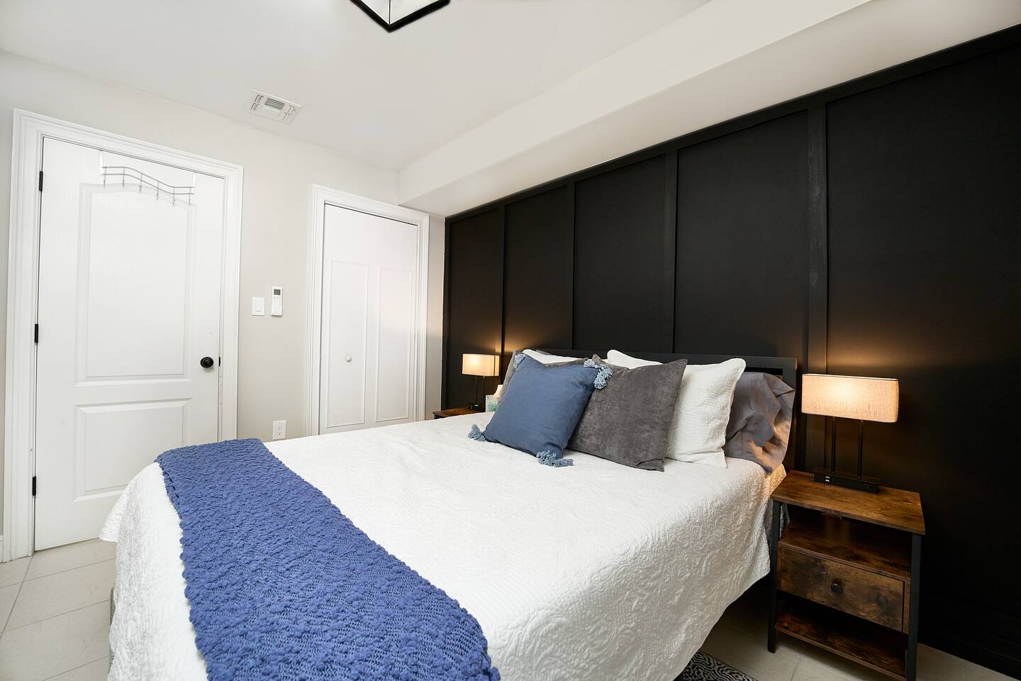 The Black Room also features a full closet with

- Hangers
- Iron + board 
- Extra pillows 
-Linens for roll out twin bed