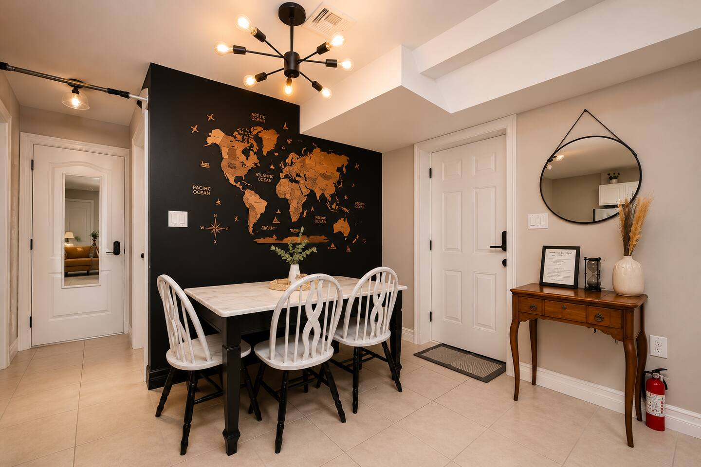 Delight in warm family meals on your dining table.

Space also showcases custom world map from artist, Enjoy the Wood!