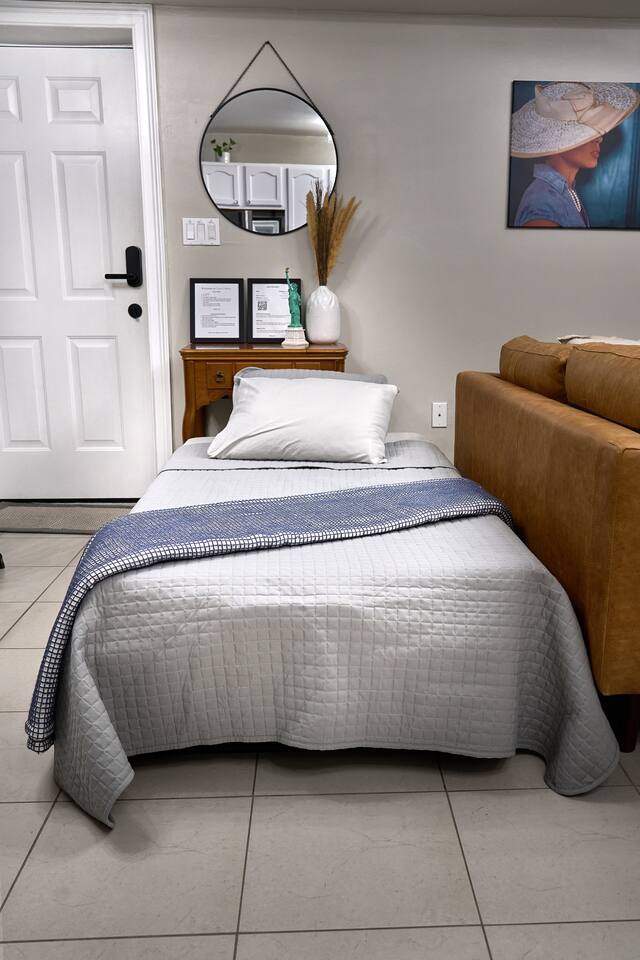Pull out twin bed set up. Perfect for one adult or two young kids.