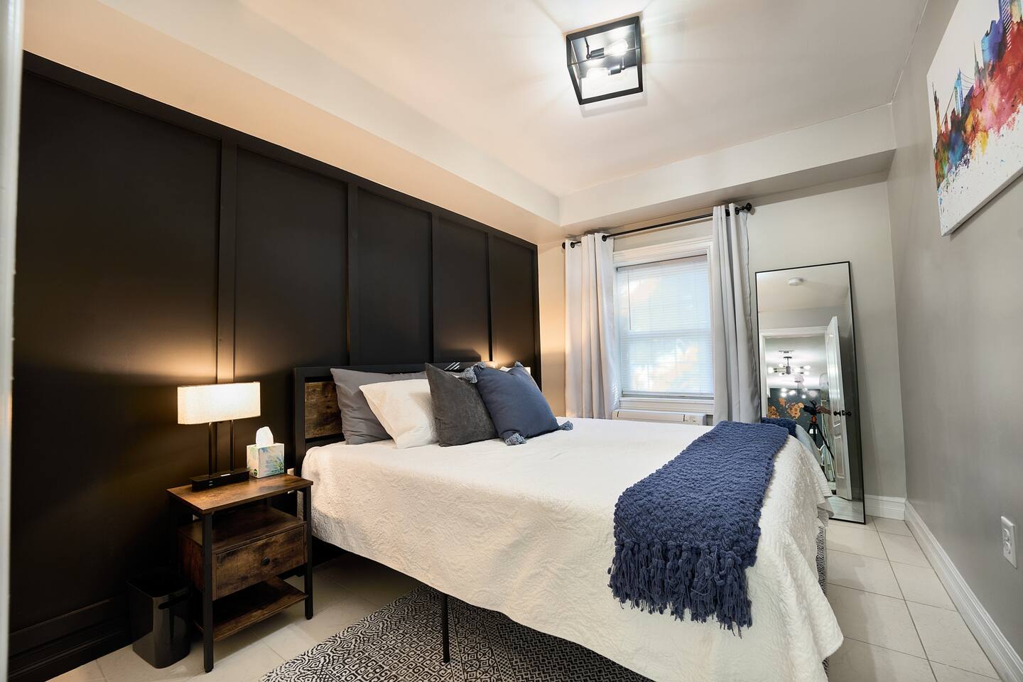 Sleep in comfort in the Black Room!

Bedroom includes:
- Super comfortable memory foam mattress
- 2 Nightstands 
- 2 touch lamps with usb input and outlet to connect your devices.
- Full mirror
- Custom Artwork
- Daiken remote controlled AC/Heat