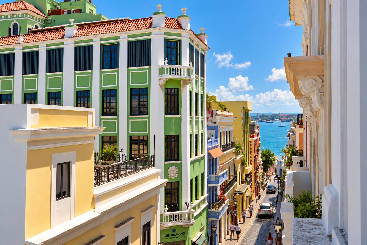 Step onto the Juliet balconies and take in the charm of Old San Juan! Colorful colonial buildings line the historic streets below, leading your gaze toward the sparkling blue waters of San Juan Bay. A picture-perfect glimpse of Puerto Rico!