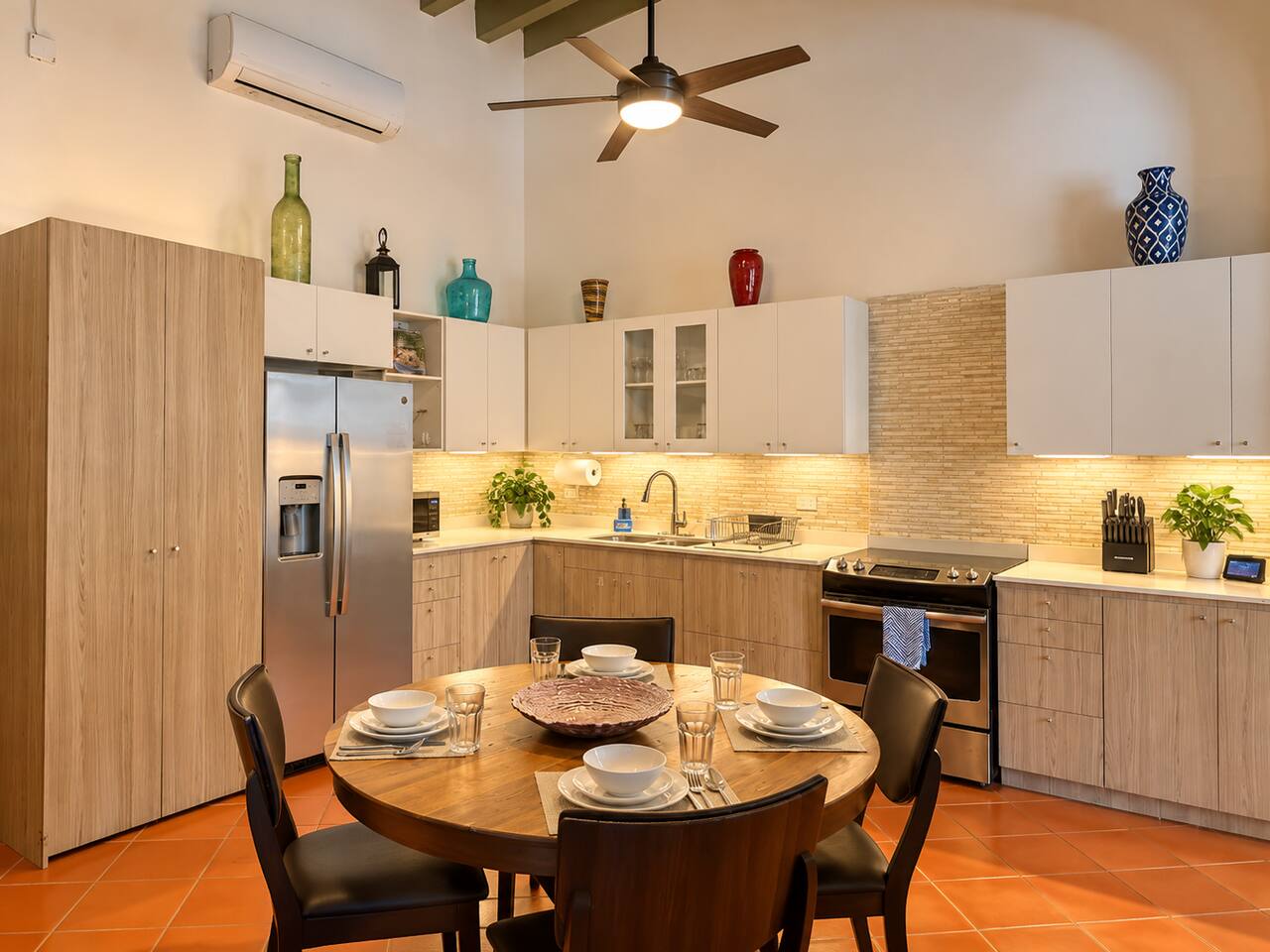 Enjoy a fully equipped kitchen and a charming second dining area, perfect for leisurely morning coffee, casual meals, or gathering with family and friends.