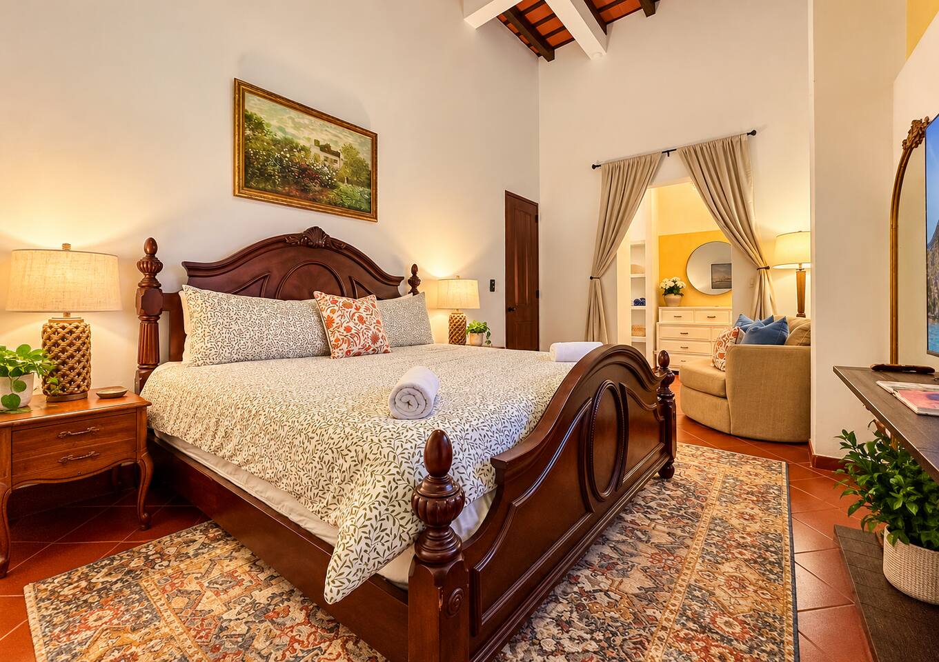 Unwind in the peaceful primary suite, featuring a spacious king bed, Smart TV, A/C, and private en-suite bathroom—your own comfortable retreat after a day exploring Old San Juan.