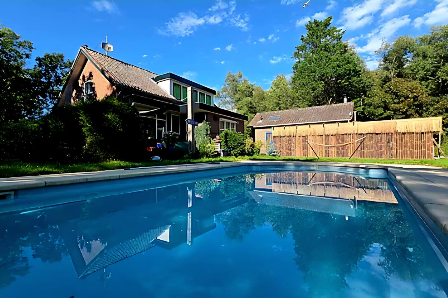 Villa in the forest of Amsterdam with Pool