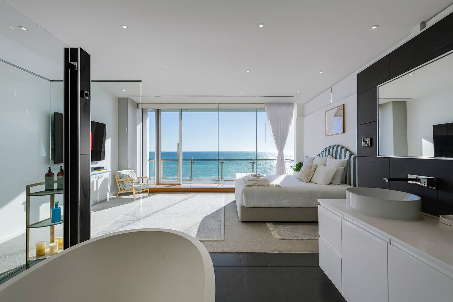 Master suite with panoramic ocean views and private balcony
