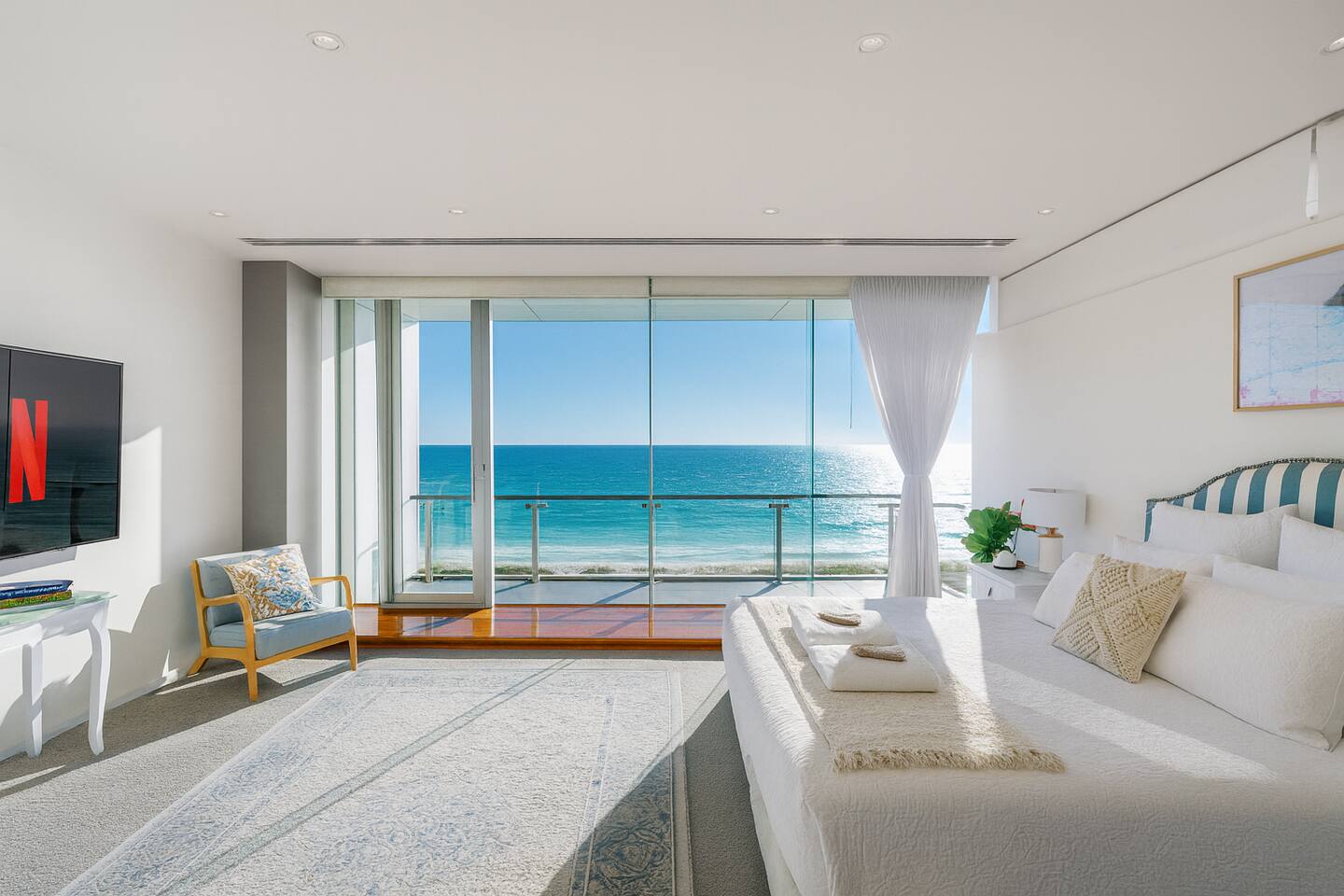 Plush king bed with the waves as your soundtrack