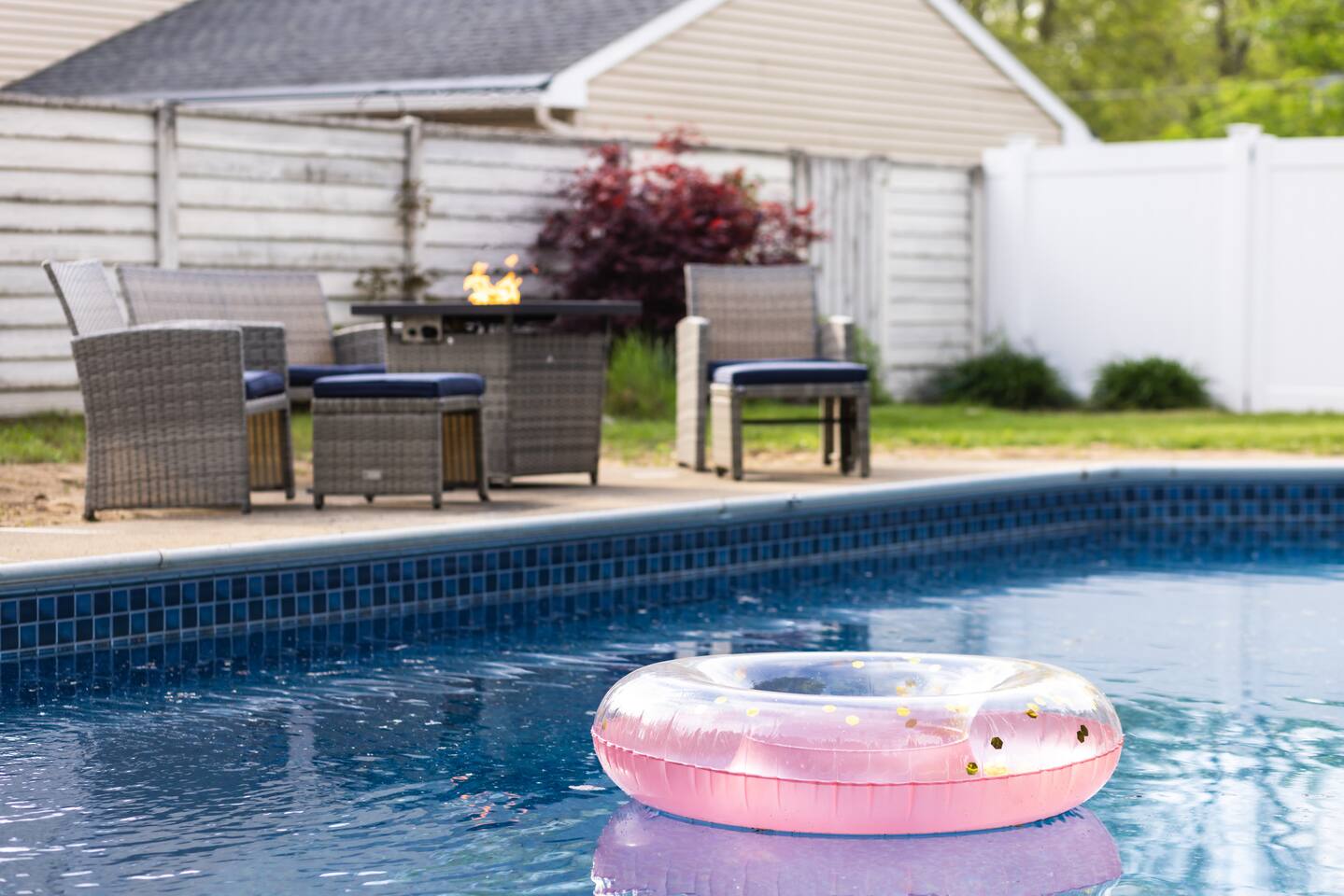 Heated pool in a serene fenced lounge area